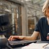 Girl sitting in front of the laptop