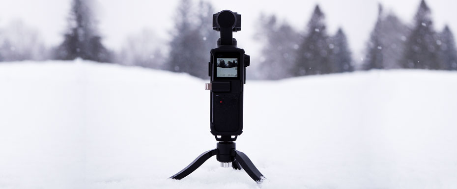 Tripod with camera outside on the snow