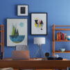 Blue walls in bright office home desk