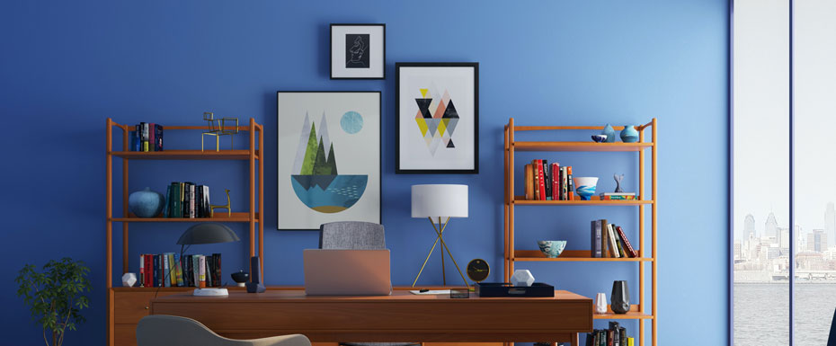 Blue walls in bright office home desk