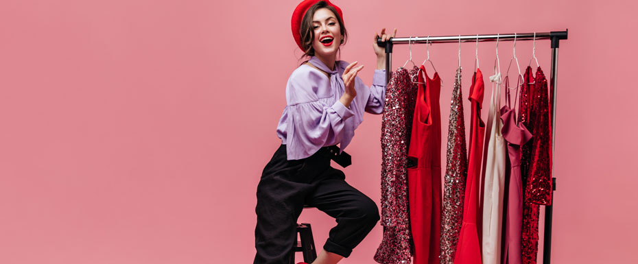 Slim Lady Fashionable Trousers Blouse Red Hat Is Sitting Chair Stand With Shiny Dresses