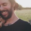 Man Carrying daughter in black sleeveless top